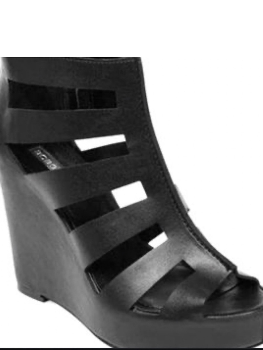 BCBGeneration black caged wedge sandal size 7 with a platform sole